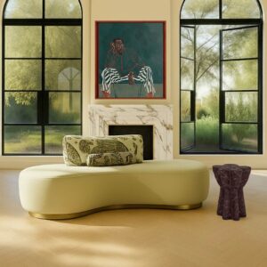 Elegant interior with sofa, art, and large windows.